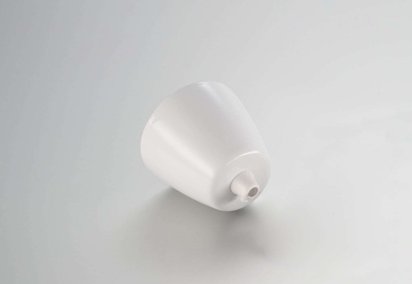 A white Coolicon Vitreous Enamel ceiling cup