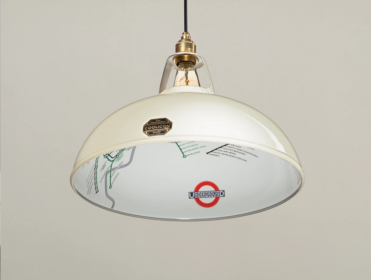 A Large Paper Cream shade hanging over a cream background