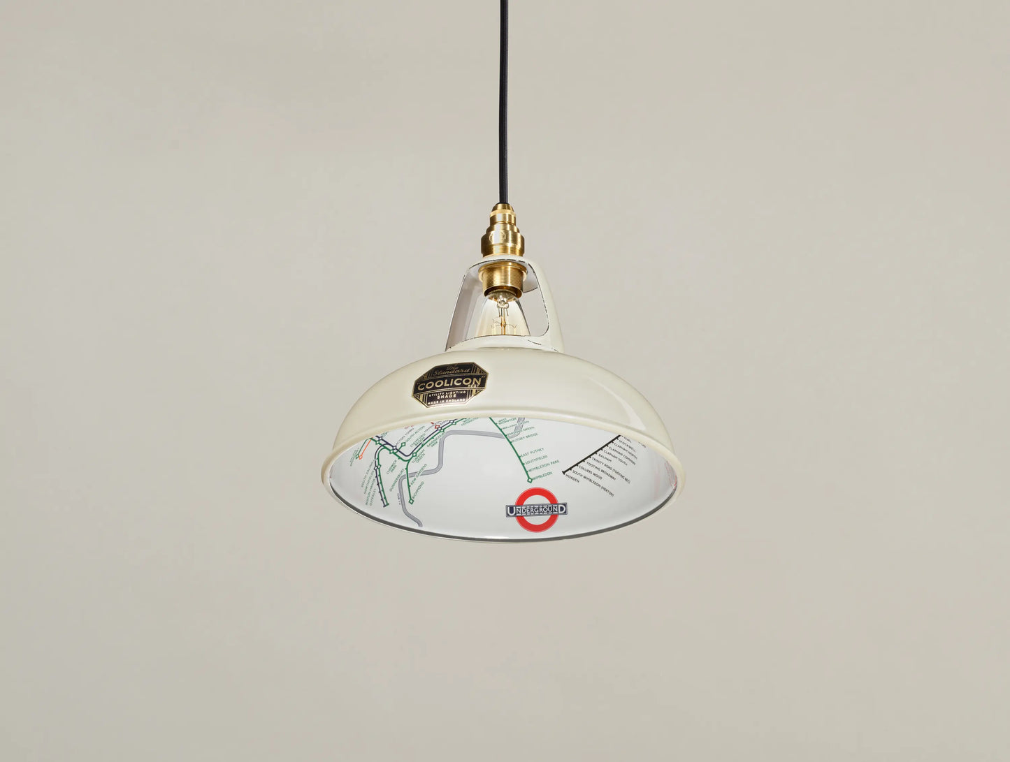 An Original Paper Cream shade hanging over a cream background
