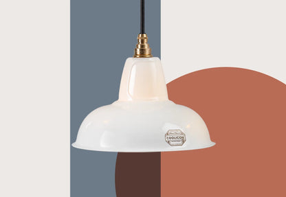 A Fine Bone China Silhouette Coolicon shade hangs over a colourful geometric background