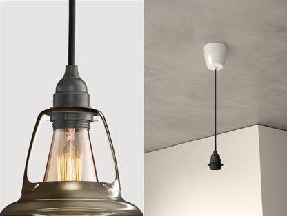 Close up of an E27 Industrial suspension set on an Antinium shade on the left. On the right, an E27 Industrial pendant set is hanging from the ceiling