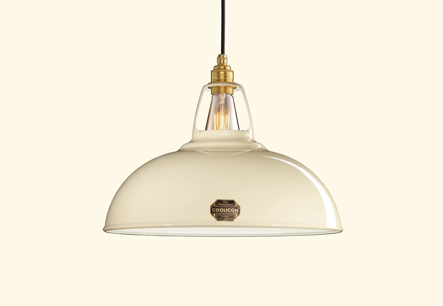 Large Classic Cream Coolicon lampshade with a black Industrial pendant set over a light cream background