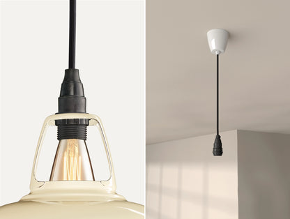 Close up of an E14 Industrial suspension set on a Underground Map lampshade on the left. On the right, an E14 Industrial pendant set is hanging from the ceiling