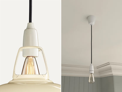 Close up of an E14 Porcelain suspension set on a Paper Cream lampshade on the left. On the right, an E14 Porcelain pendant set with a lightbulb is hanging from the ceiling