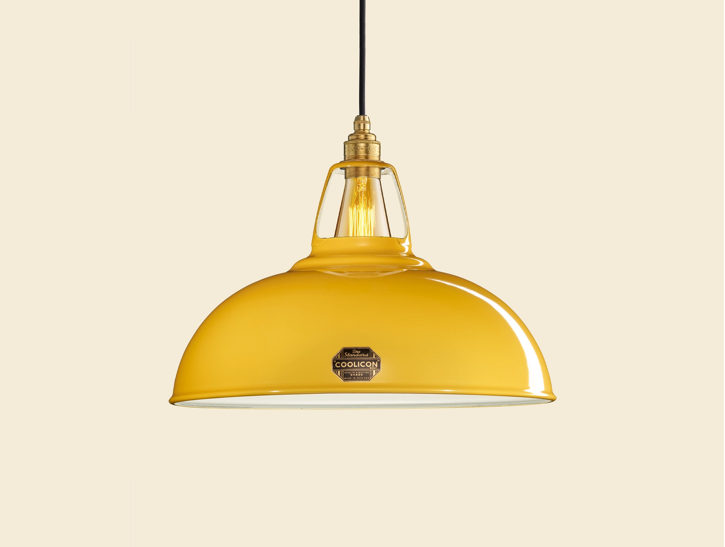 Large Deep Yellow Coolicon lampshade with a Porcelain pendant set over a yellow background