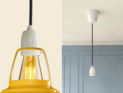 Close up of an E27 Porcelain suspension set on a Deep Yellow lampshade on the left. On the right, an E27 Porcelain pendant set is hanging from the ceiling