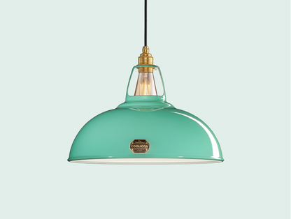 Large Fresh Teal Coolicon lampshade with a Brass pendant set over a light teal background