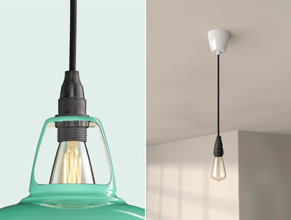 Close up of an E14 Industrial suspension set on a Fresh Teal lampshade on the left. On the right, an E14 Industrial pendant set with a lightbulb is hanging from the ceiling