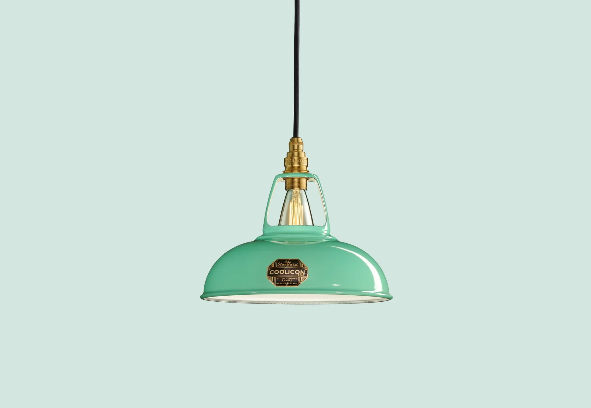 Fresh Teal Coolicon lampshade with a Porcelain pendant set over a light teal background