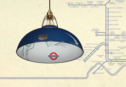 A Large Piccadilly Line Blue shade over a paper texture with the London Underground map