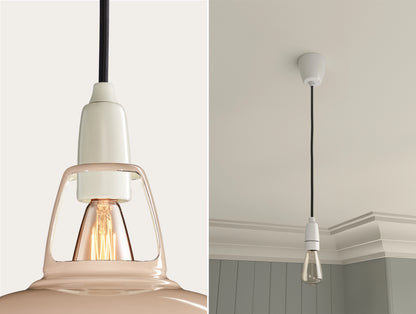 Close up of an E14 Porcelain suspension set on a Latte Brown lampshade on the left. On the right, an E14 Porcelain pendant set with a lightbulb is hanging from the ceiling