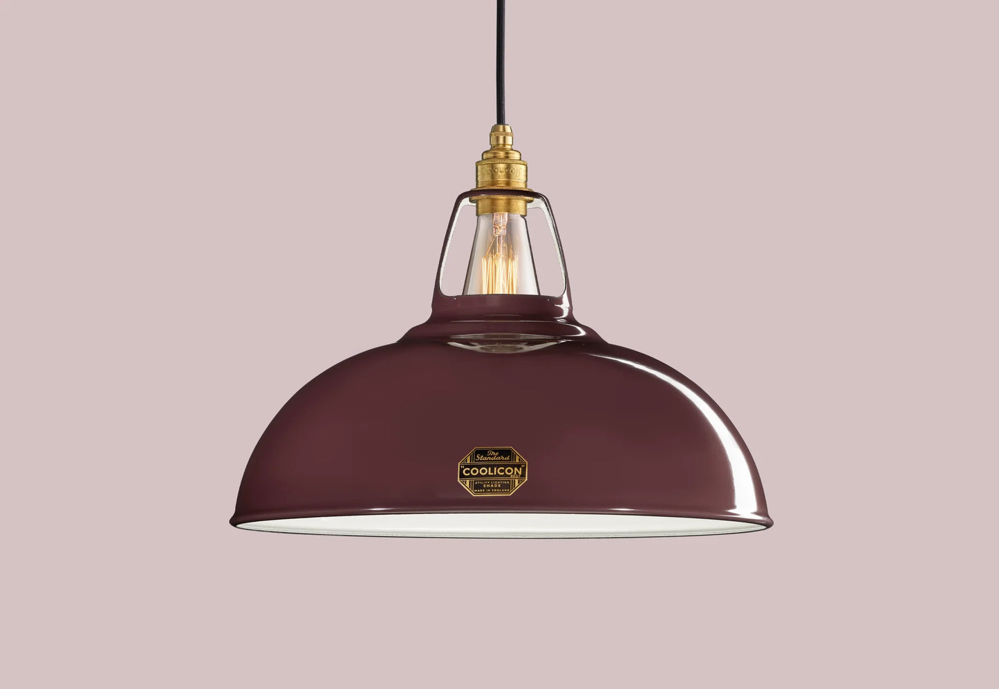 Large Metropolitan purple Coolicon lampshade with a Signature Brass pendant set over a light purple background