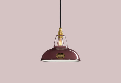 Metropolitan purple Coolicon lampshade with a Signature Brass pendant set over a light purple background