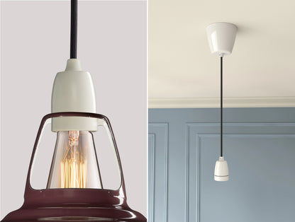 Close up of an E27 Porcelain suspension set on a Metropolitan lampshade on the left. On the right, an E27 Porcelain pendant set is hanging from the ceiling