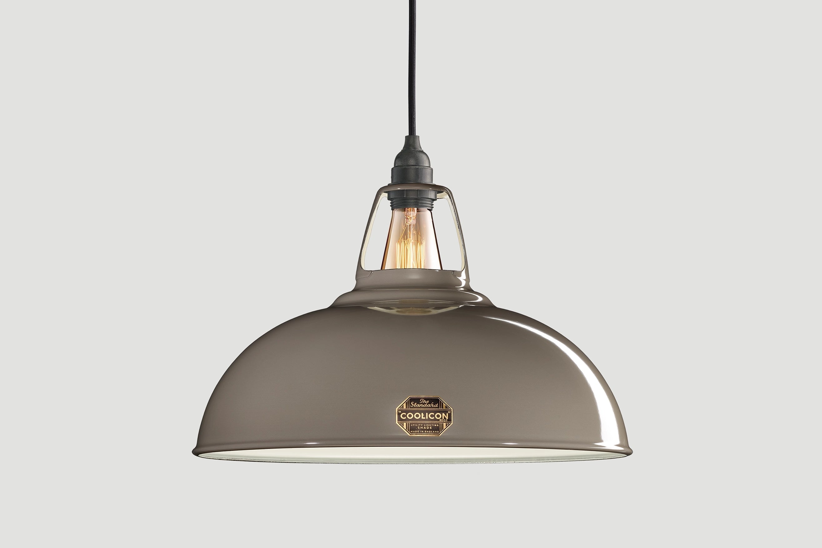 Large Original Grey Coolicon lampshade with a black Industrial pendant set over a light grey background