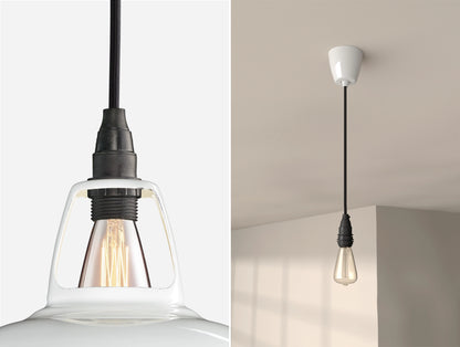 Close up of an E14 Industrial suspension set on a Original White lampshade on the left. On the right, an E14 Industrial pendant set with a lightbulb is hanging from the ceiling