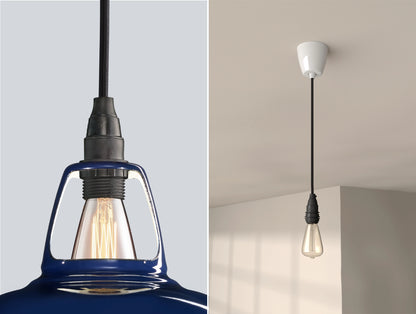 Close up of an E14 Industrial suspension set on a Royal Blue lampshade on the left. On the right, an E14 Industrial pendant set with a lightbulb is hanging from the ceiling