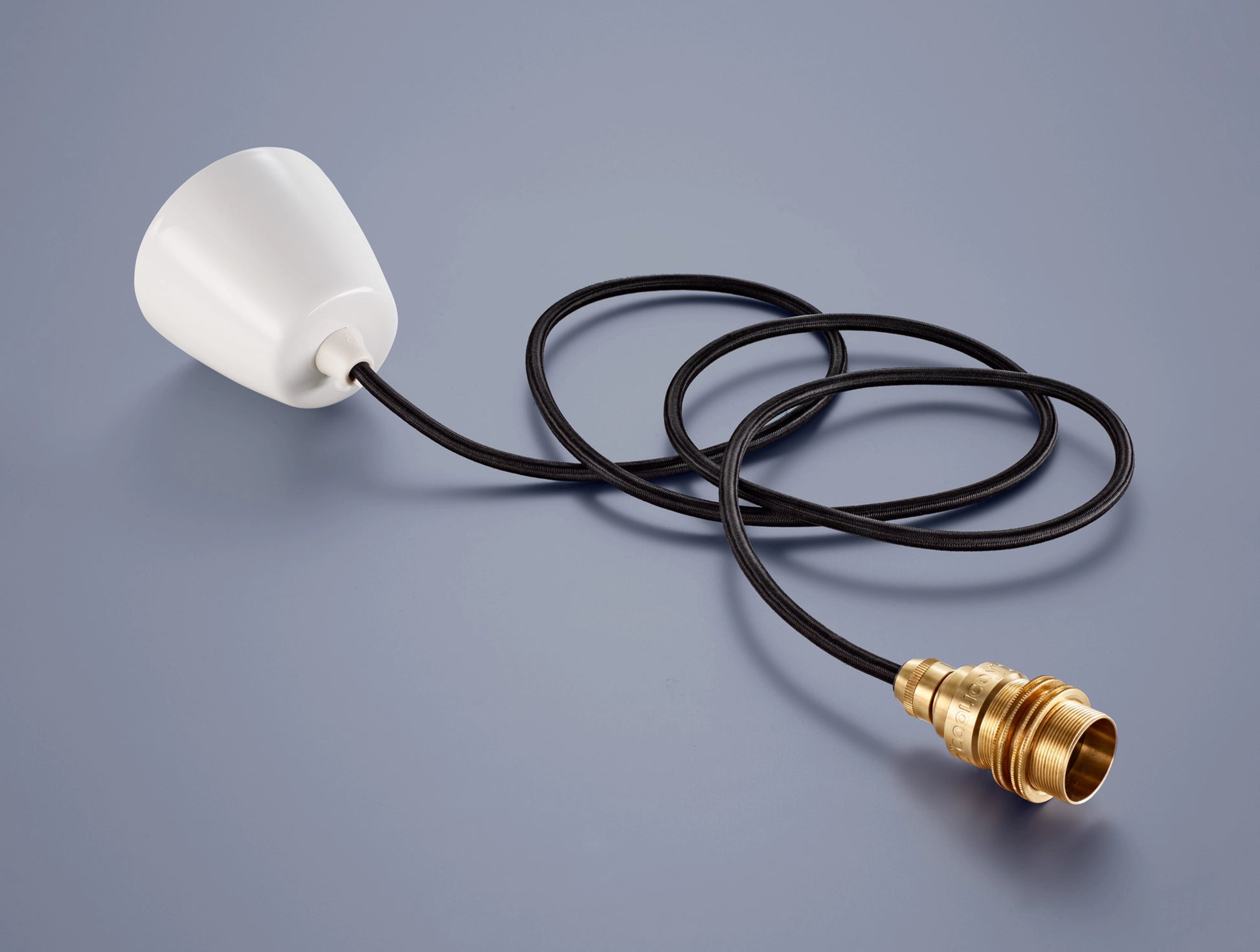 A Coolicon Signature Brass pendant set with a white Vitreous Enamel ceiling cup and black cable