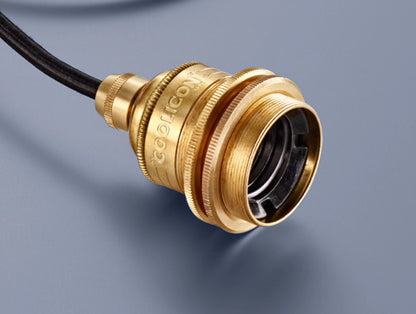Close up of the signature brass pendant set