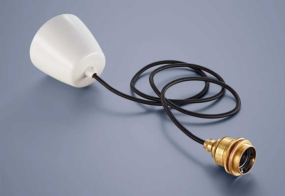 A Coolicon Signature Brass pendant set with a white Vitreous Enamel ceiling cup and black cable