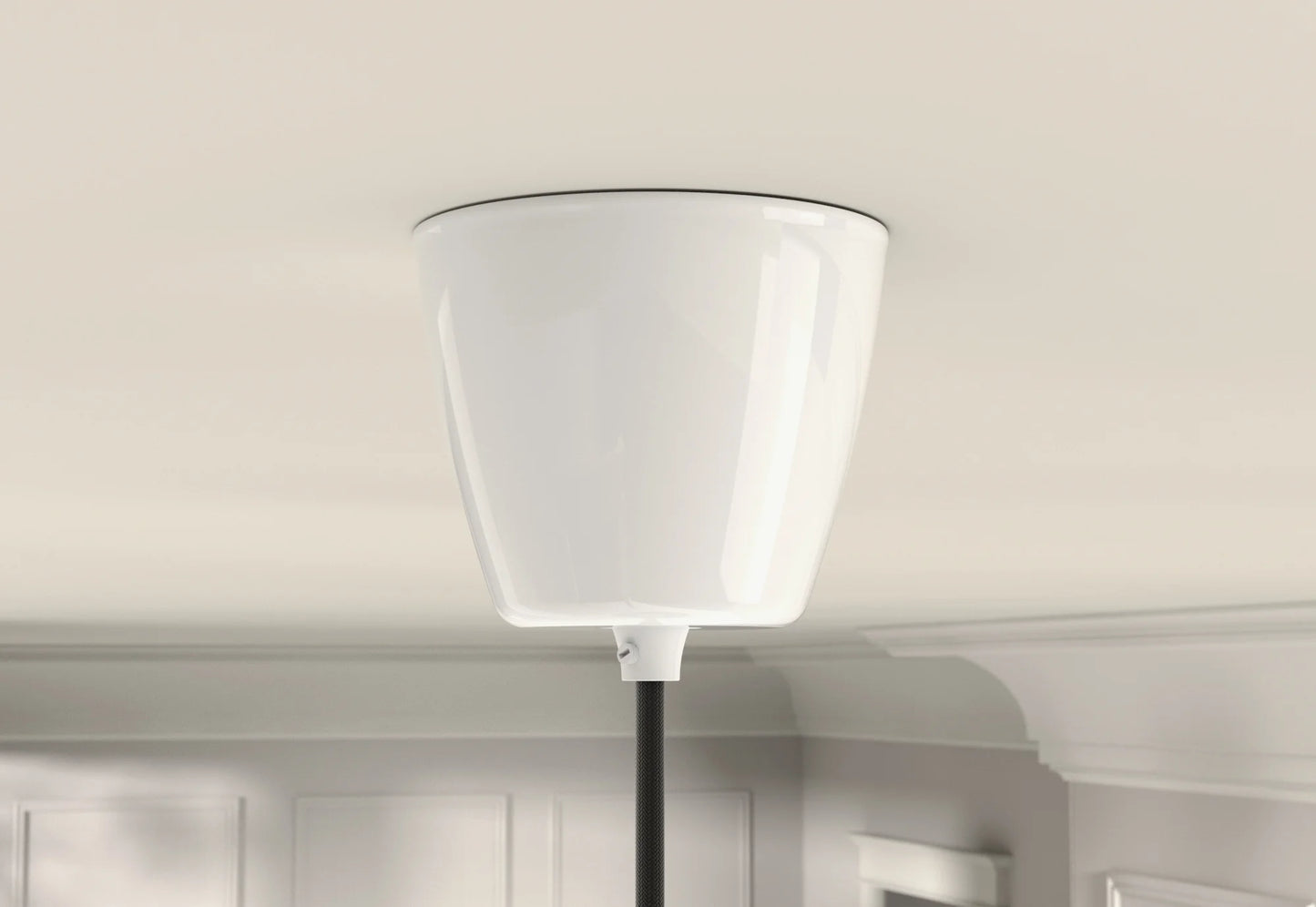 A white Coolicon Vitreous Enamel ceiling cup on a light cream ceiling