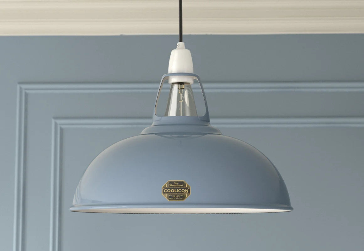 A Large Sky Blue lampshade with a Coolicon Porcelain pendant set hanging from the ceiling