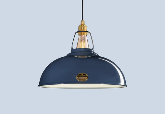 Large Selvedge blue Coolicon lampshade with a Signature Brass pendant set over a light blue background