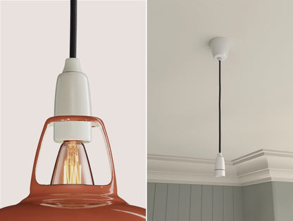 Close up of an E14 Porcelain suspension set on a Terracotta lampshade on the left. On the right, an E14 Porcelain pendant set is hanging from the ceiling
