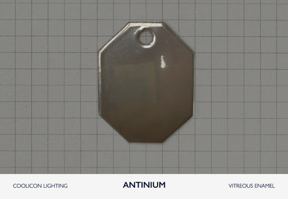A vitreous enamel colour sample of the colour Antinium from Coolicon Lighting. This is a near metallic finish