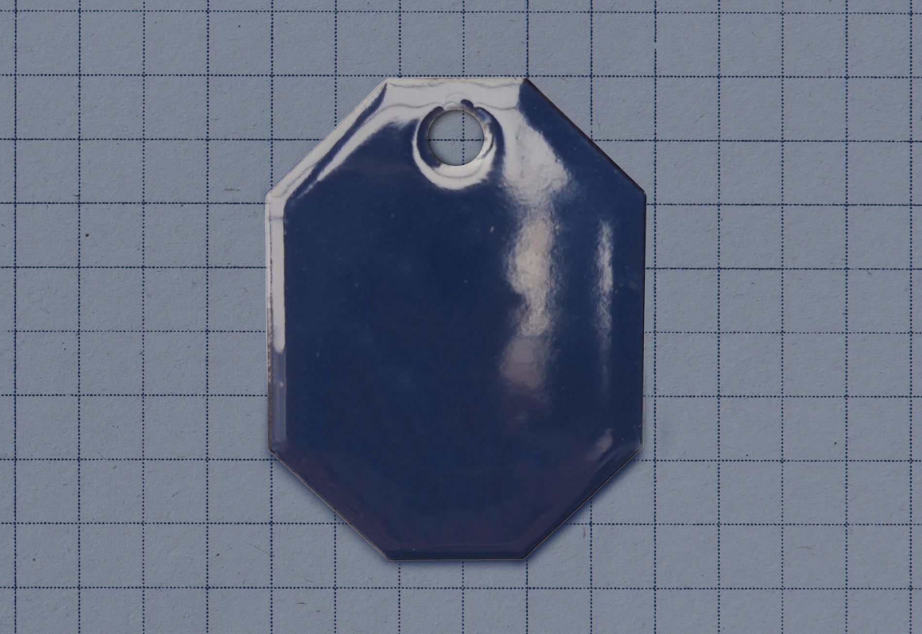 A vitreous enamel colour sample of the colour Royal Blue from Coolicon Lighting