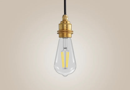 E27 LED Lightbulb hanging over a light background. The lightbulb is fitted with a Coolicon Brass Suspension Set