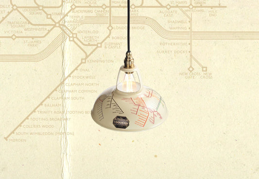 An Original Underground Map shade over a paper texture with the London Underground map. 
