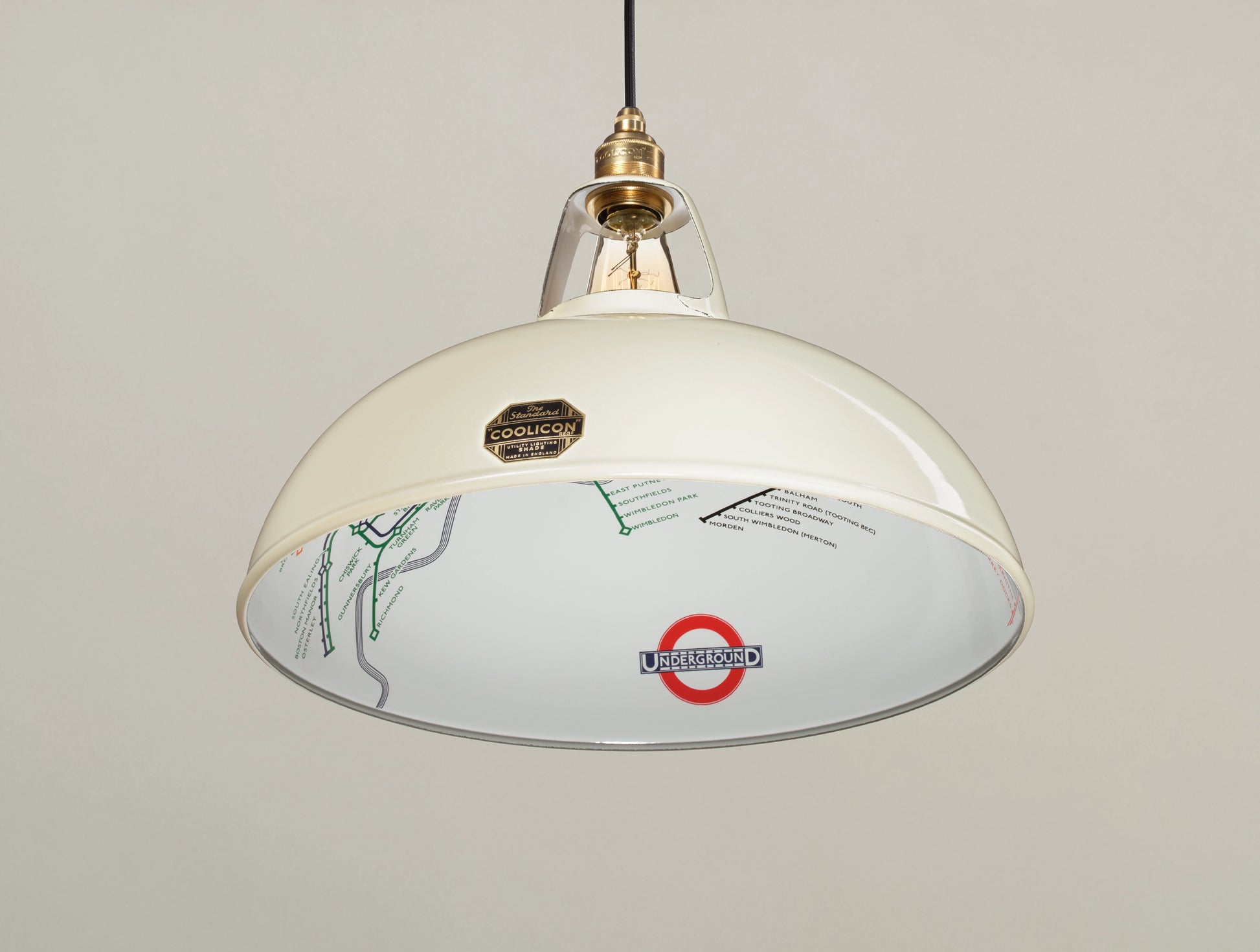 A Large Paper Cream shade hanging over a cream background